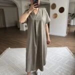 V YAKA DÜŞÜK KOL ETEĞİ OVAL KETEN ELBİSE - VİZON